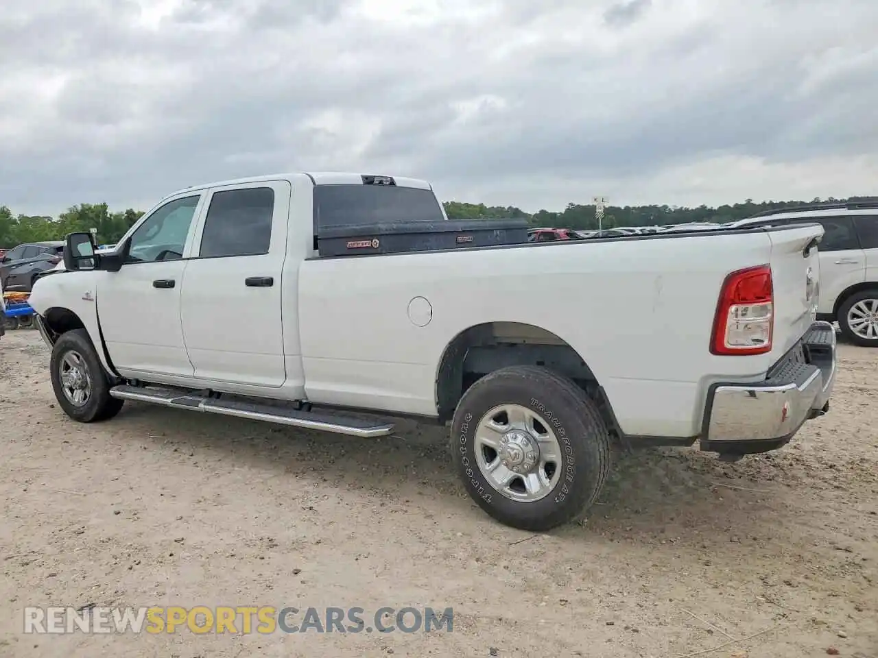 2 Photograph of a damaged car 3C6UR5HL8RG253487 RAM 2500 2024