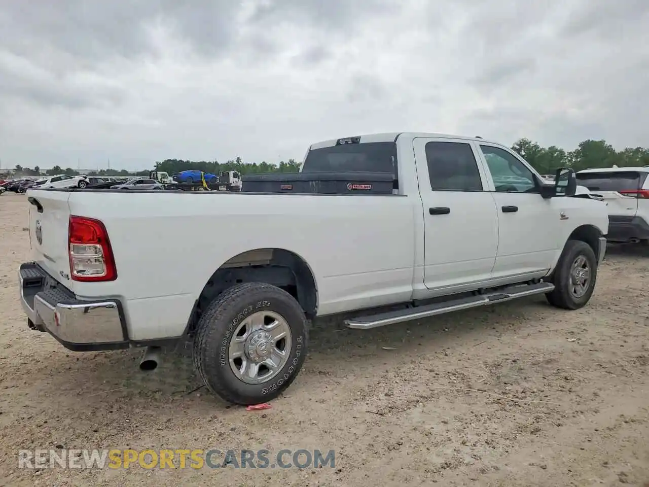 3 Photograph of a damaged car 3C6UR5HL8RG253487 RAM 2500 2024
