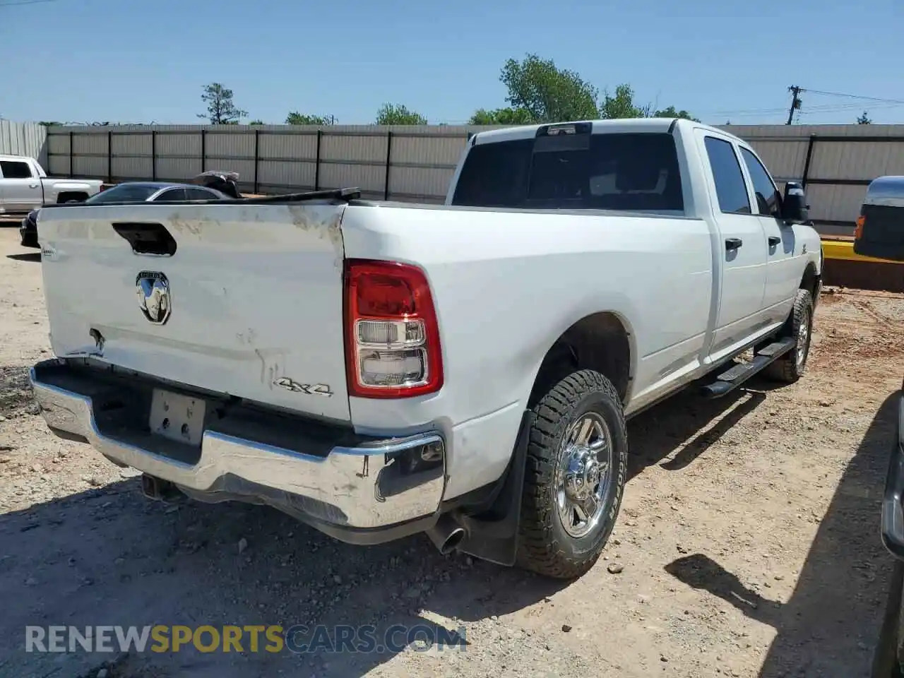 3 Photograph of a damaged car 3C6UR5HL9RG141202 RAM 2500 2024