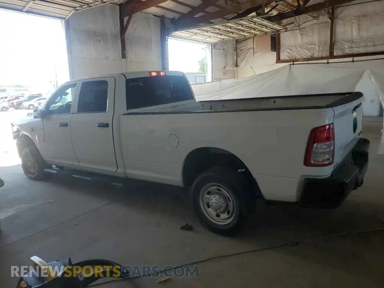 2 Photograph of a damaged car 3C6UR5HLXRG196919 RAM 2500 2024