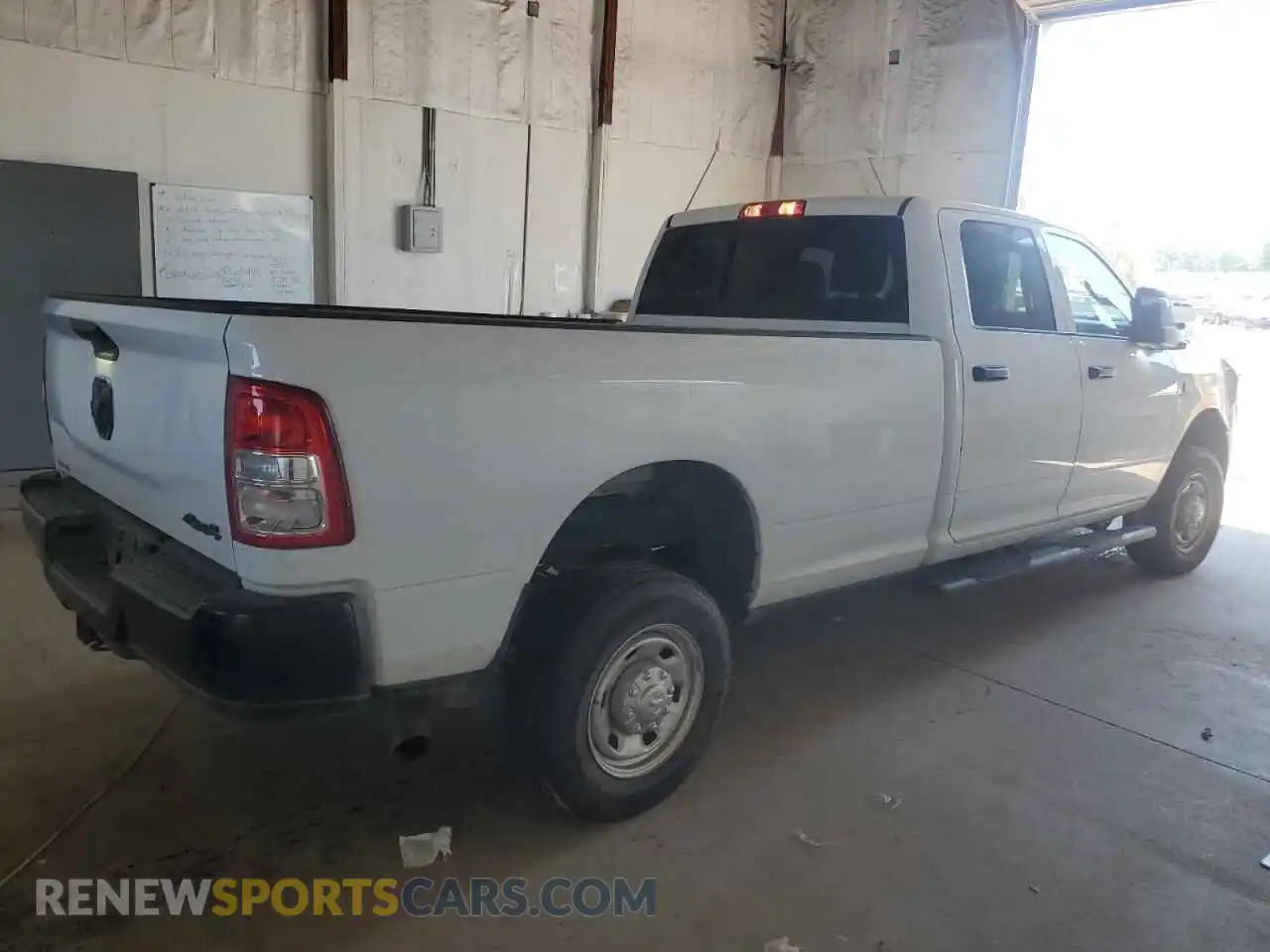 3 Photograph of a damaged car 3C6UR5HLXRG196919 RAM 2500 2024