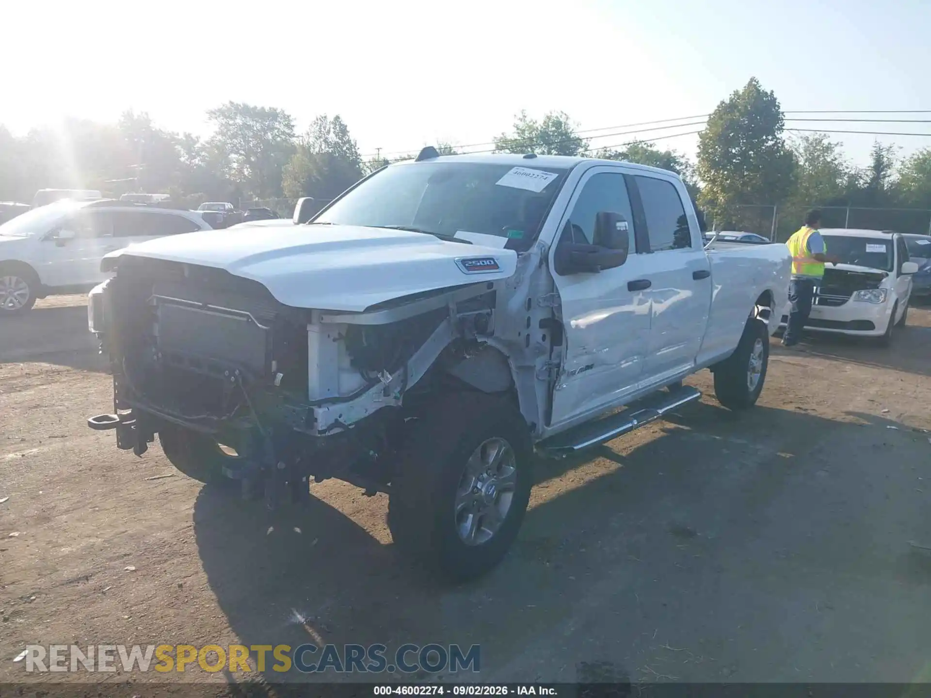 2 Photograph of a damaged car 3C6UR5JJ0RG343290 RAM 2500 2024
