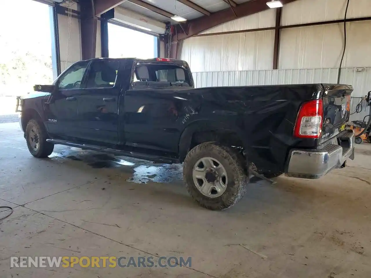 2 Photograph of a damaged car 3C6UR5JJ3RG193093 RAM 2500 2024