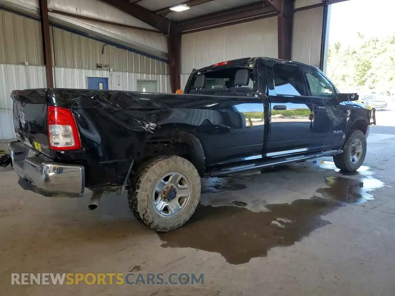 3 Photograph of a damaged car 3C6UR5JJ3RG193093 RAM 2500 2024
