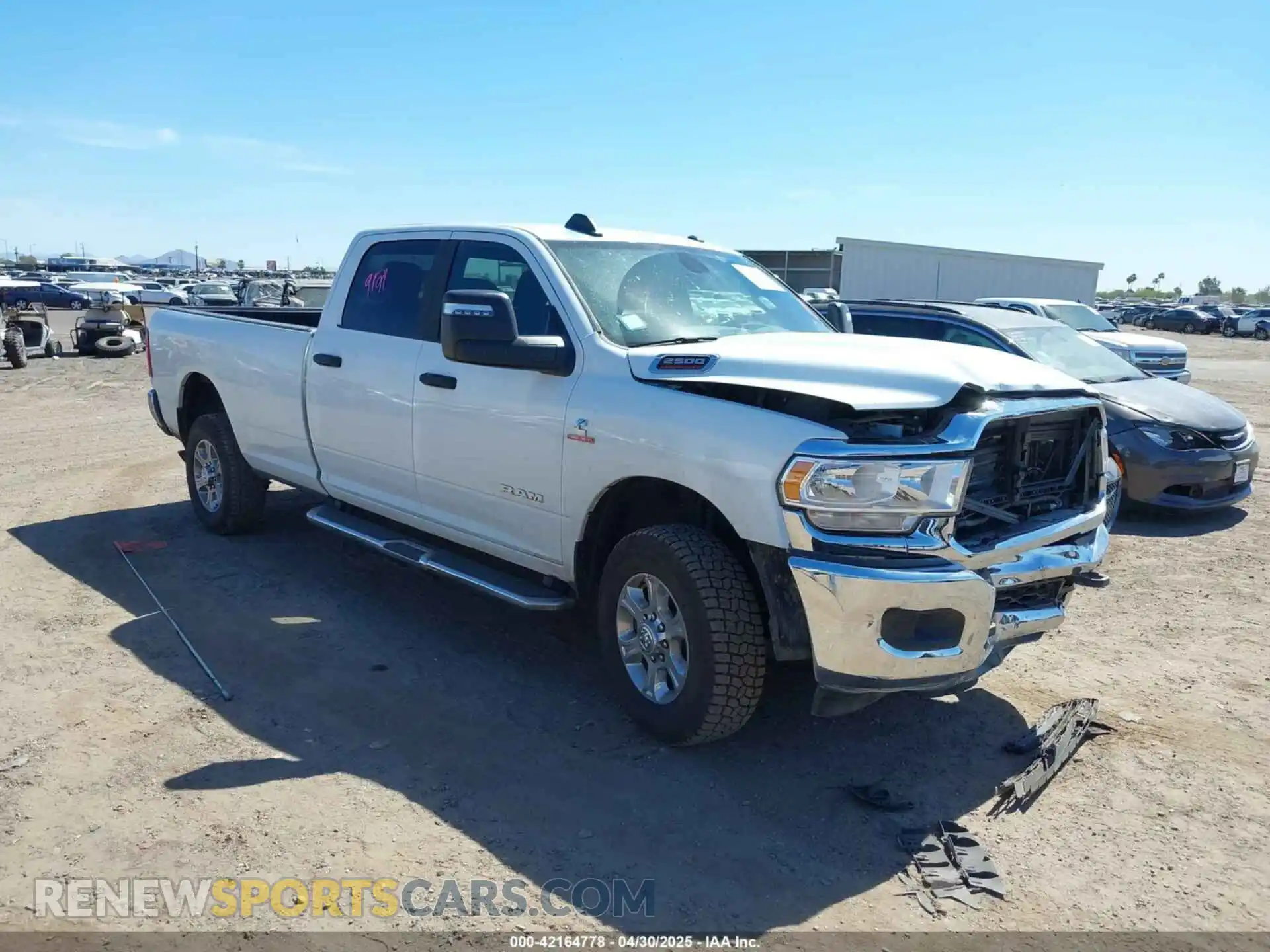 1 Photograph of a damaged car 3C6UR5JL2RG337668 RAM 2500 2024