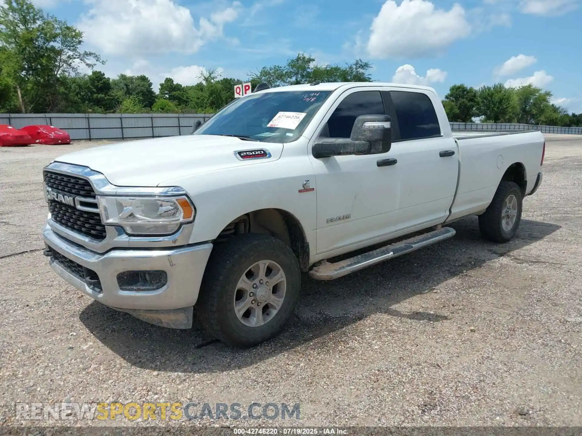 2 Photograph of a damaged car 3C6UR5JL3RG337694 RAM 2500 2024