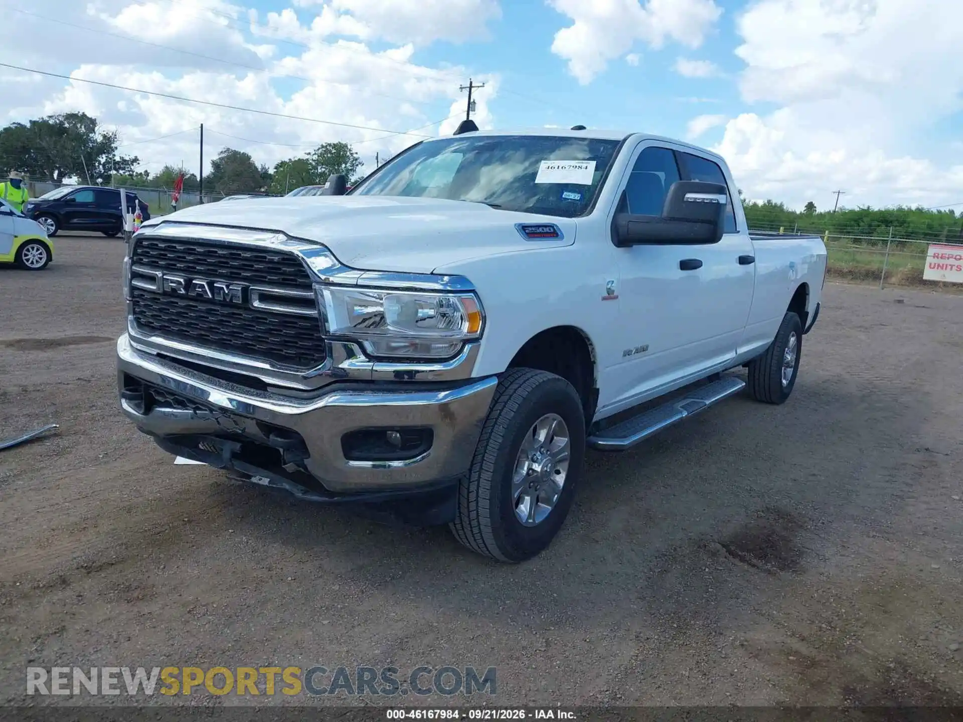 2 Photograph of a damaged car 3C6UR5JL8RG340123 RAM 2500 2024