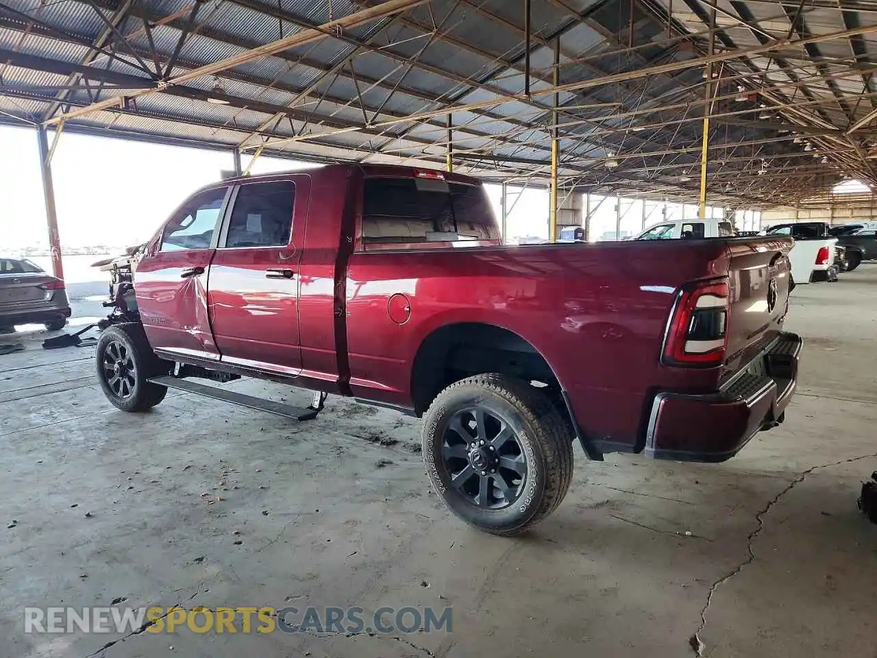 2 Photograph of a damaged car 3C6UR5NL0RG221198 RAM 2500 2024