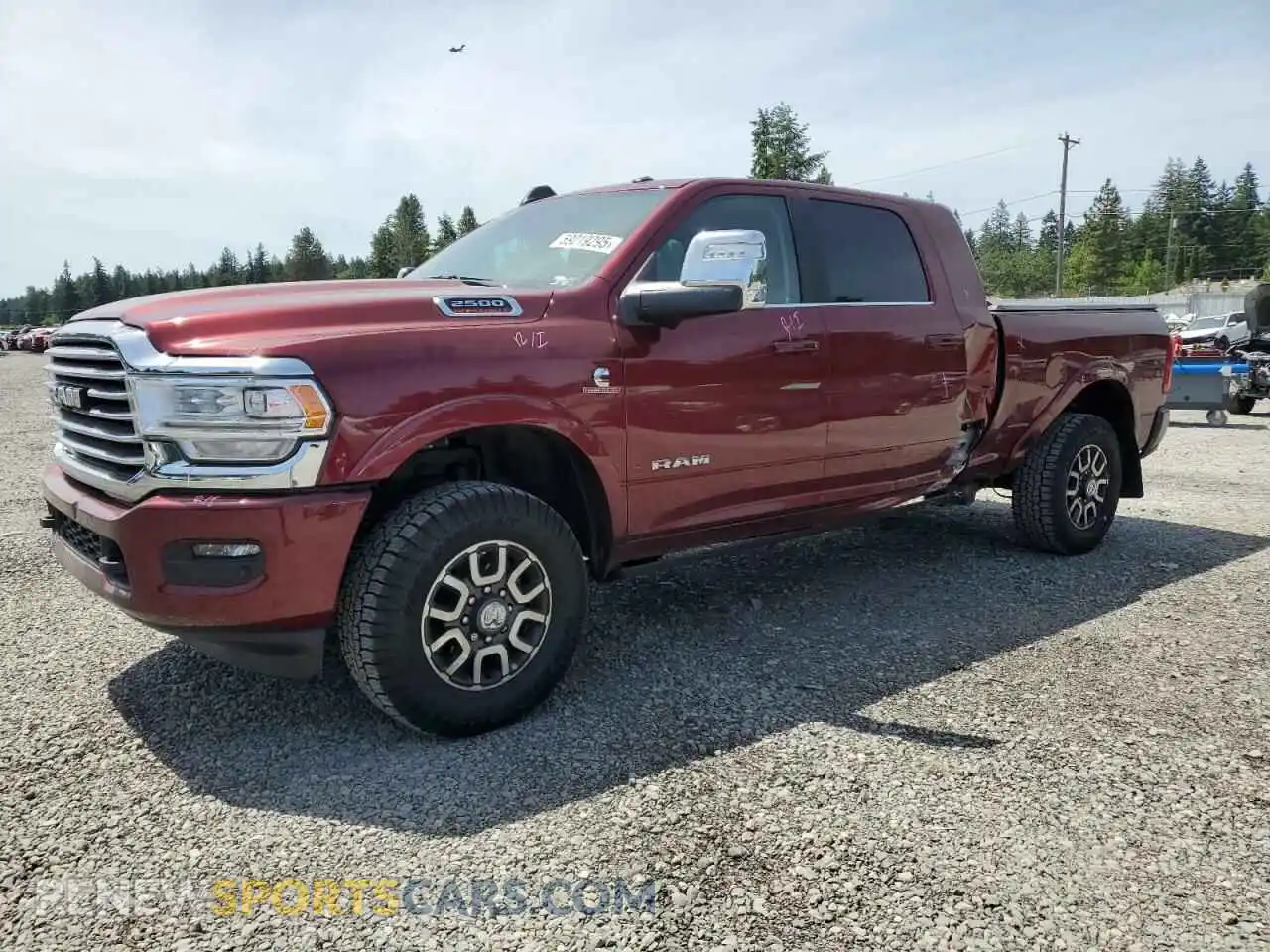1 Photograph of a damaged car 3C6UR5PL2RG383945 RAM 2500 2024