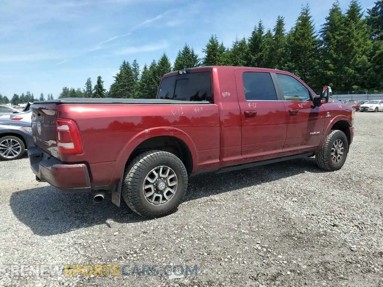 3 Photograph of a damaged car 3C6UR5PL2RG383945 RAM 2500 2024