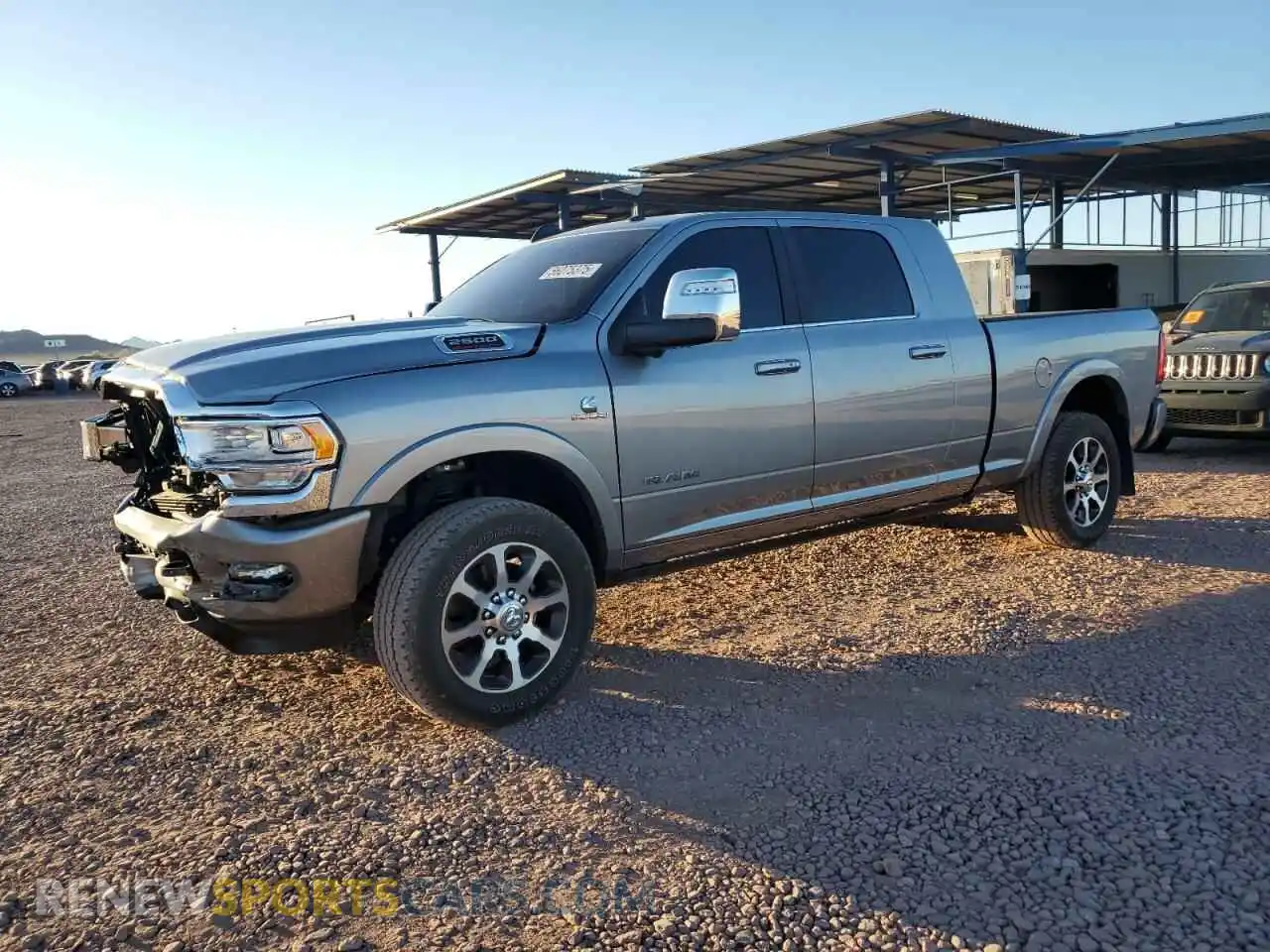 1 Photograph of a damaged car 3C6UR5PLXRG236532 RAM 2500 2024