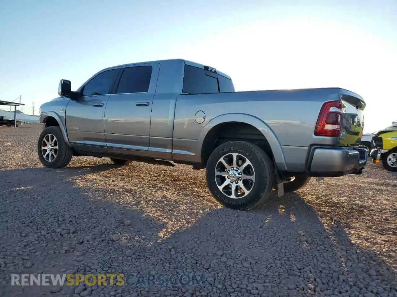 2 Photograph of a damaged car 3C6UR5PLXRG236532 RAM 2500 2024