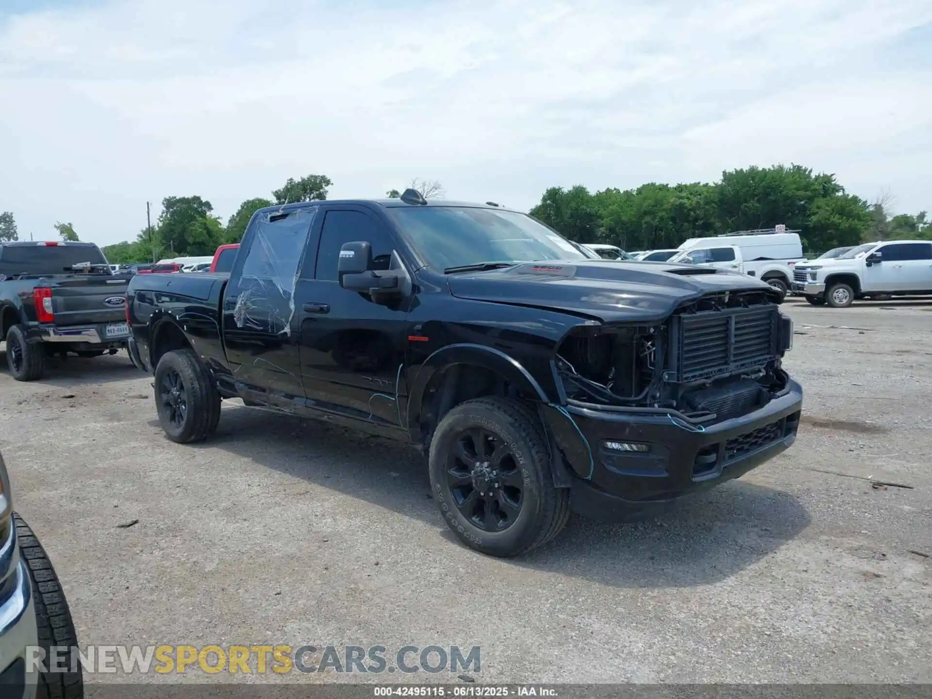 1 Photograph of a damaged car 3C6UR5SL4RG142587 RAM 2500 2024