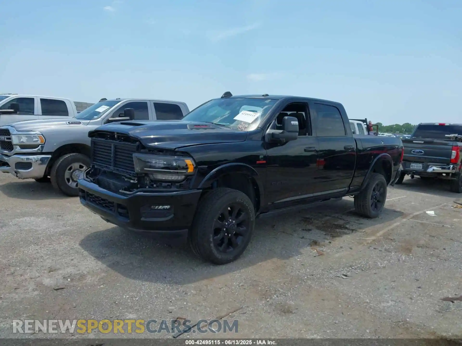 2 Photograph of a damaged car 3C6UR5SL4RG142587 RAM 2500 2024