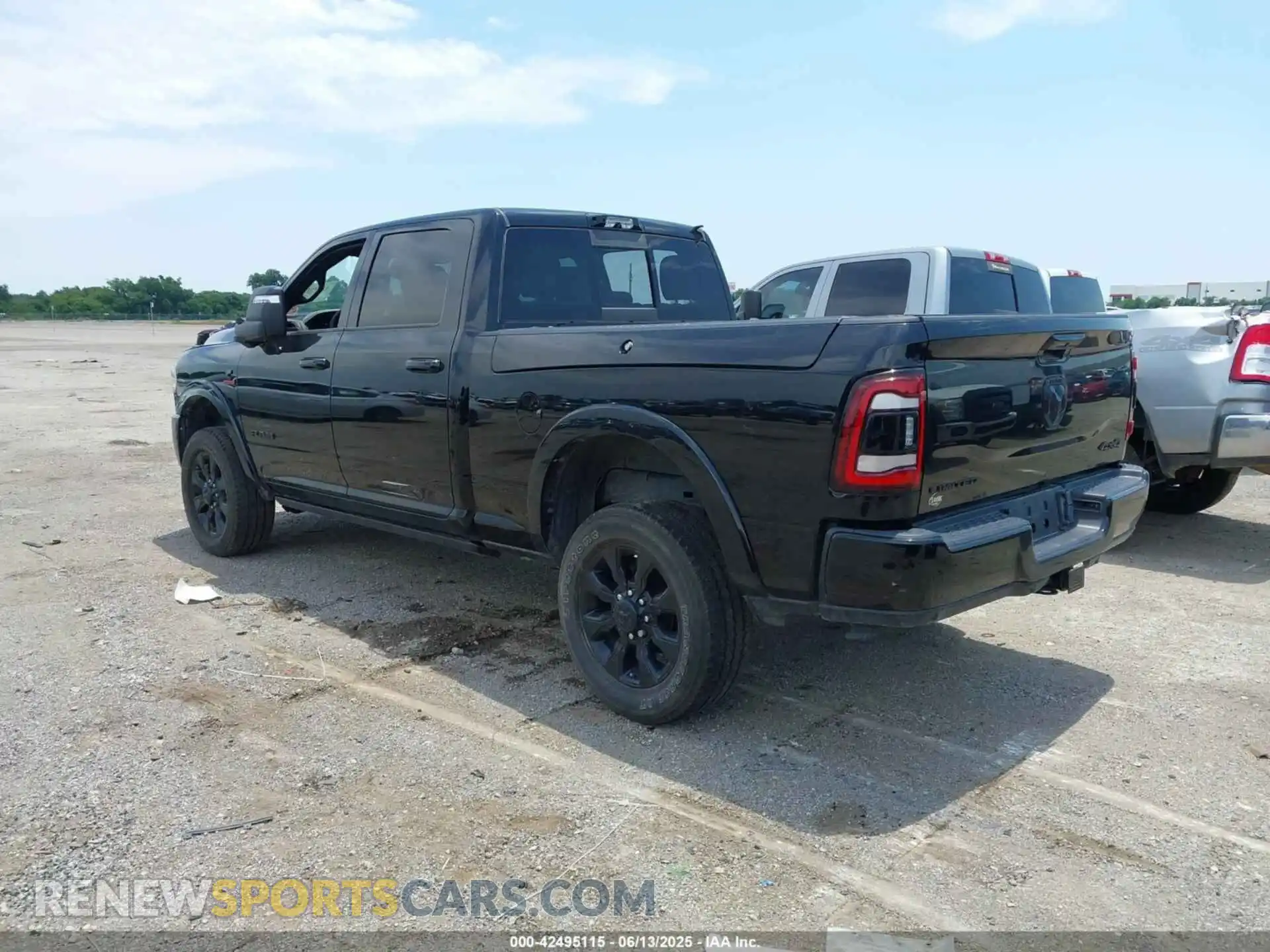 3 Photograph of a damaged car 3C6UR5SL4RG142587 RAM 2500 2024
