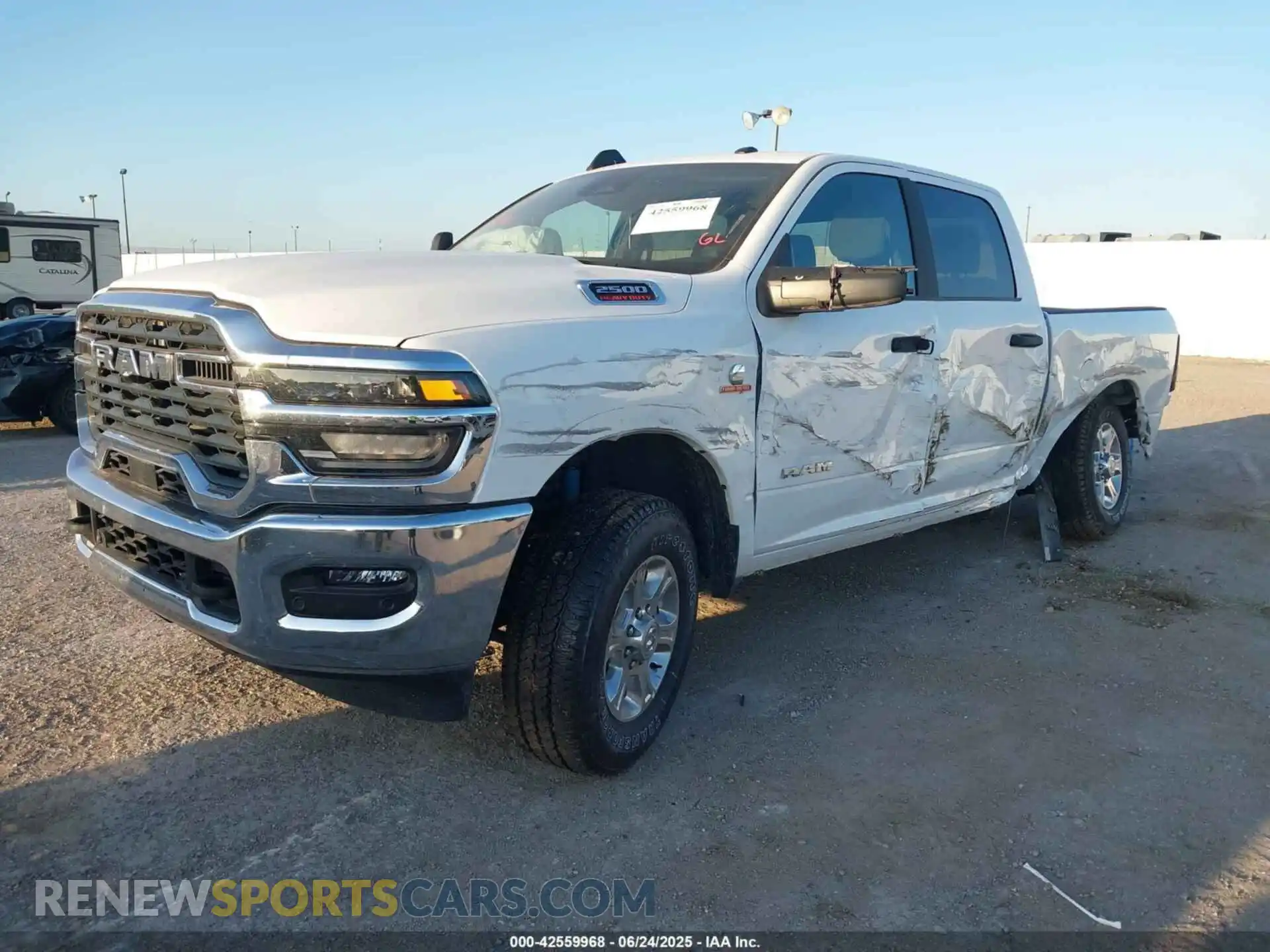 2 Photograph of a damaged car 3C63R5DL7SG528533 RAM 2500 2025