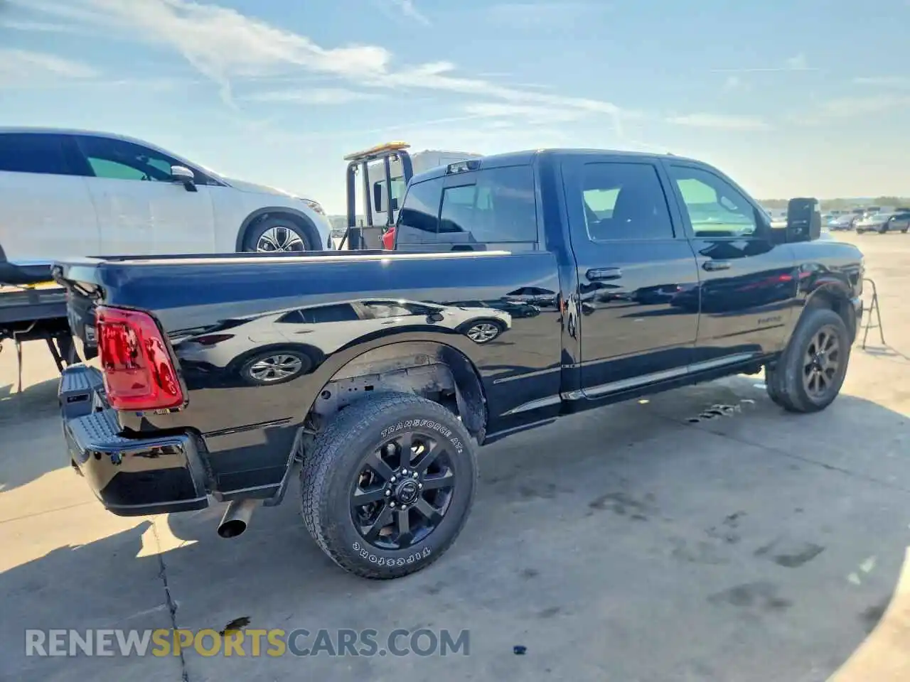 3 Photograph of a damaged car 3C63R5FL7SG507906 RAM 2500 2025