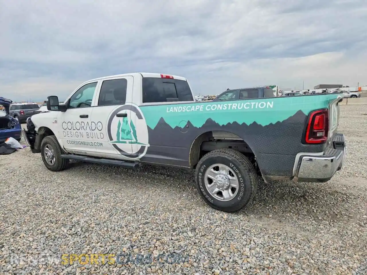2 Photograph of a damaged car 3C63R5HL2TG238230 RAM 2500 2026