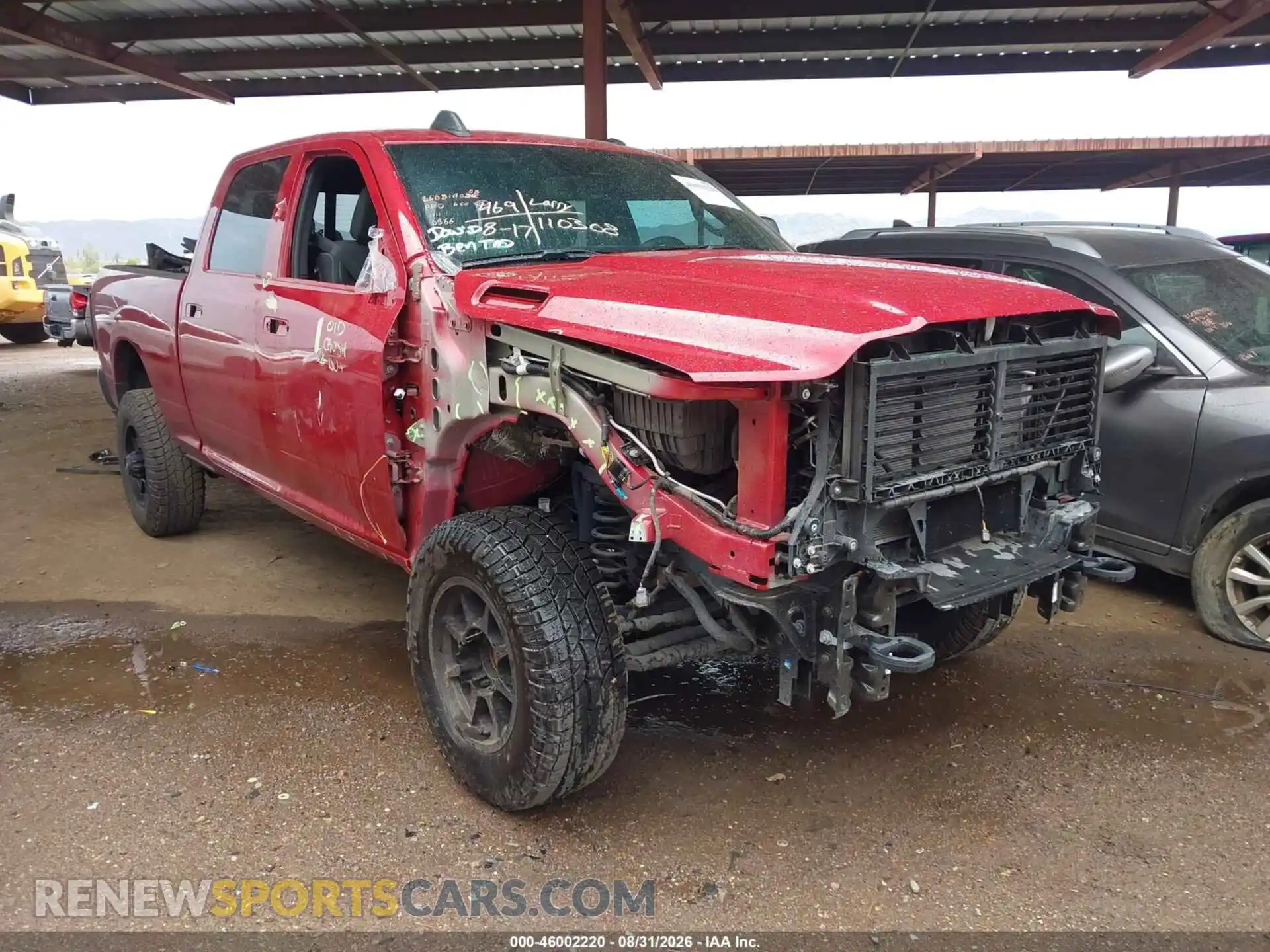 1 Photograph of a damaged car 3C6UR5CJ0TG150366 RAM 2500 2026