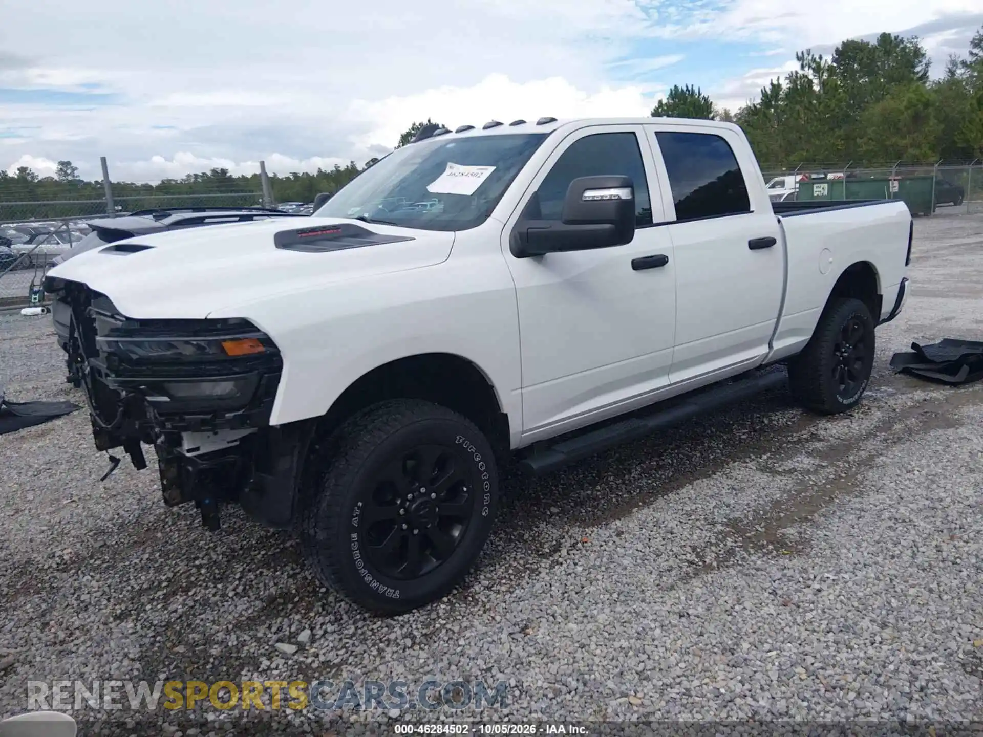 2 Photograph of a damaged car 3C6UR5CJ4TG353373 RAM 2500 2026