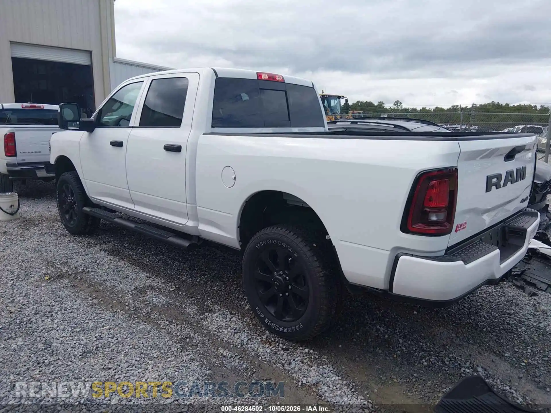 3 Photograph of a damaged car 3C6UR5CJ4TG353373 RAM 2500 2026