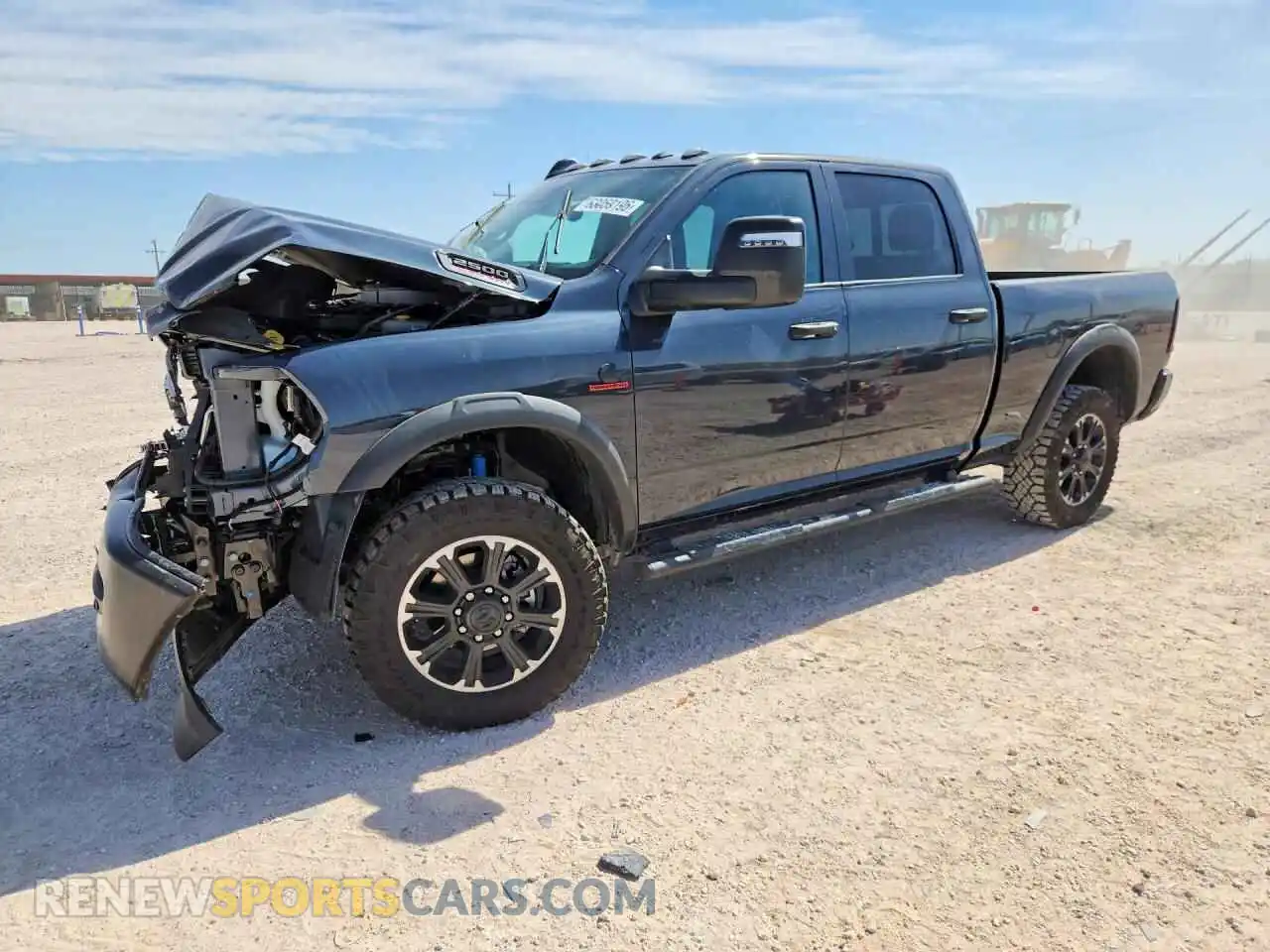 1 Photograph of a damaged car 3C6UR5CL7TG327951 RAM 2500 2026