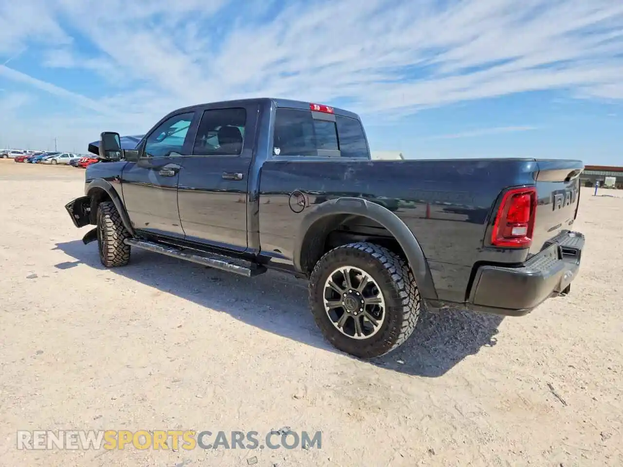 2 Photograph of a damaged car 3C6UR5CL7TG327951 RAM 2500 2026