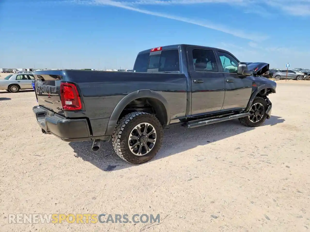 3 Photograph of a damaged car 3C6UR5CL7TG327951 RAM 2500 2026
