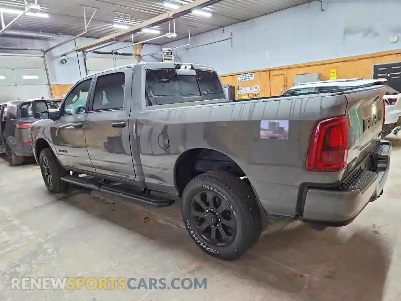 2 Photograph of a damaged car 3C6UR5DJ2TG302128 RAM 2500 2026