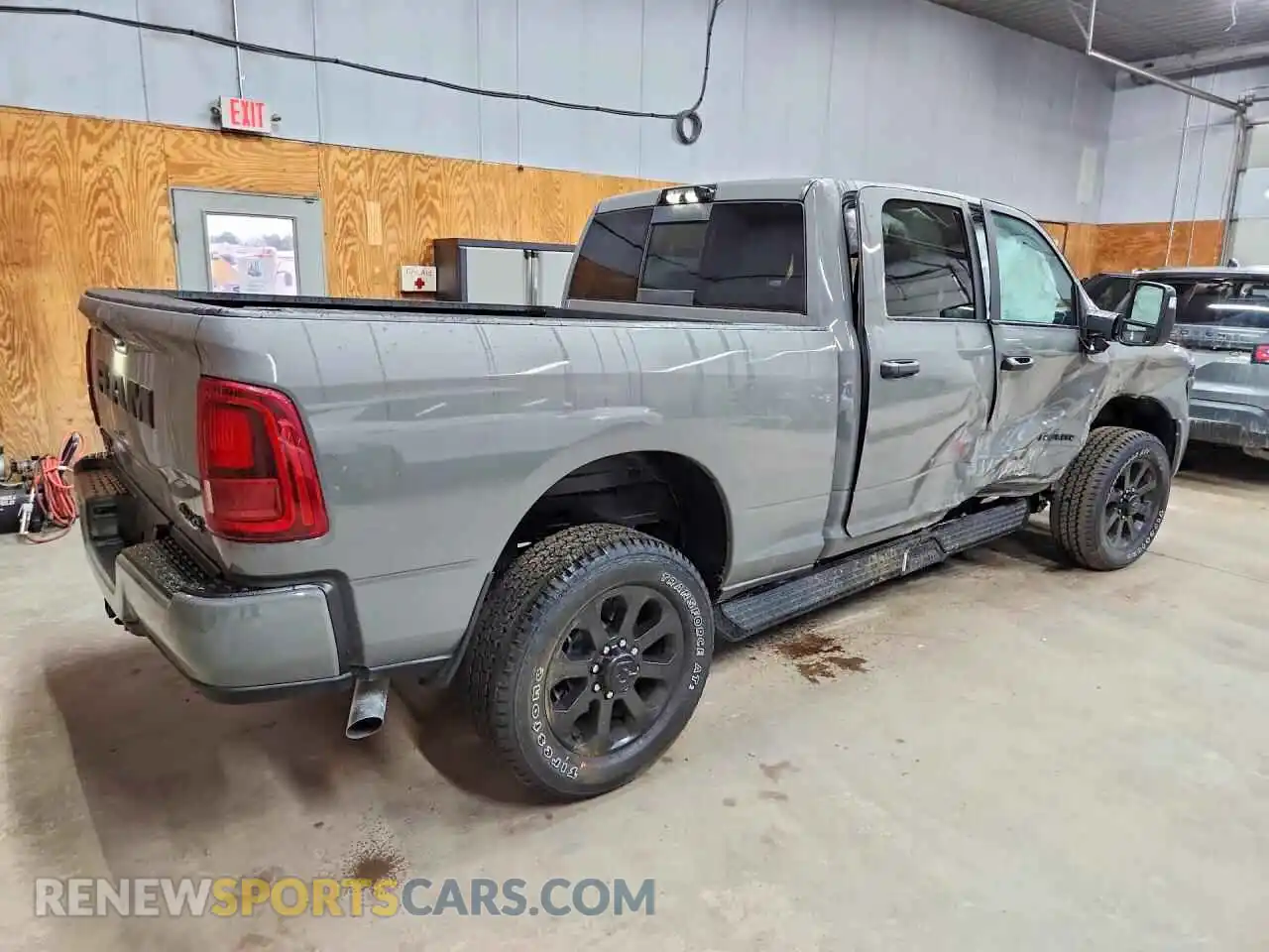 3 Photograph of a damaged car 3C6UR5DJ2TG302128 RAM 2500 2026