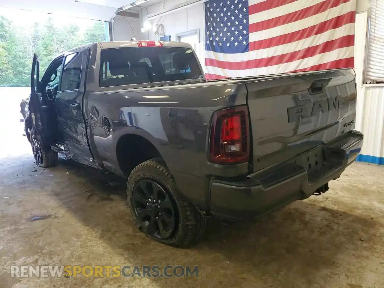 2 Photograph of a damaged car 3C6UR5DJ6TG189543 RAM 2500 2026