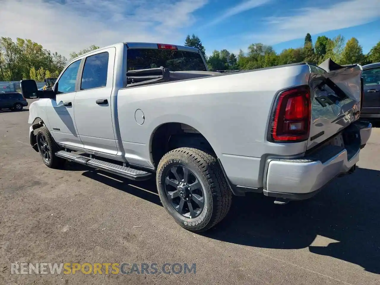 2 Photograph of a damaged car 3C6UR5DJXTG299754 RAM 2500 2026