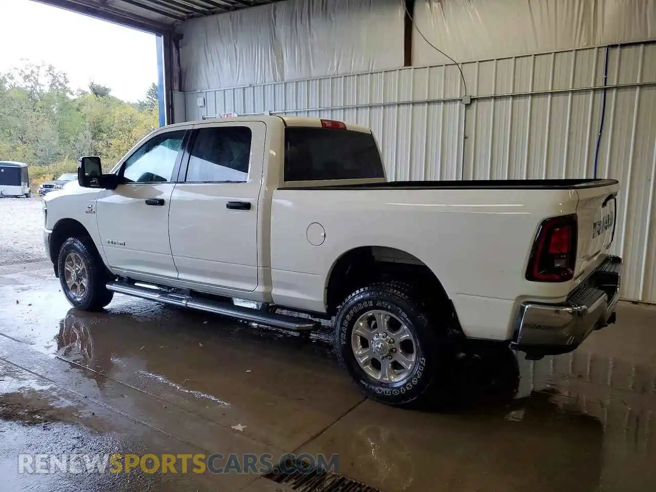 2 Photograph of a damaged car 3C6UR5DL0TG217371 RAM 2500 2026