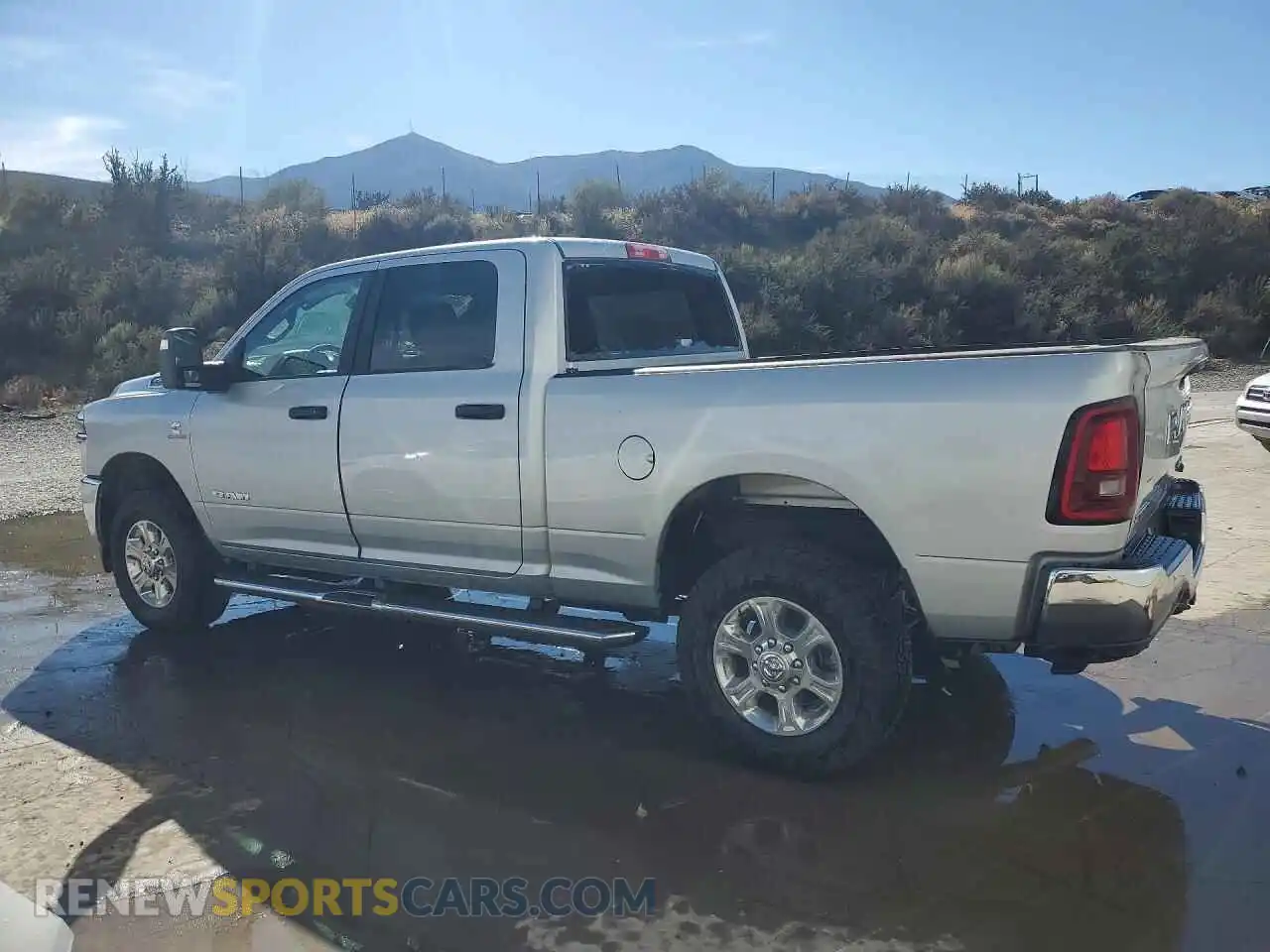 2 Photograph of a damaged car 3C6UR5DL4TG295488 RAM 2500 2026