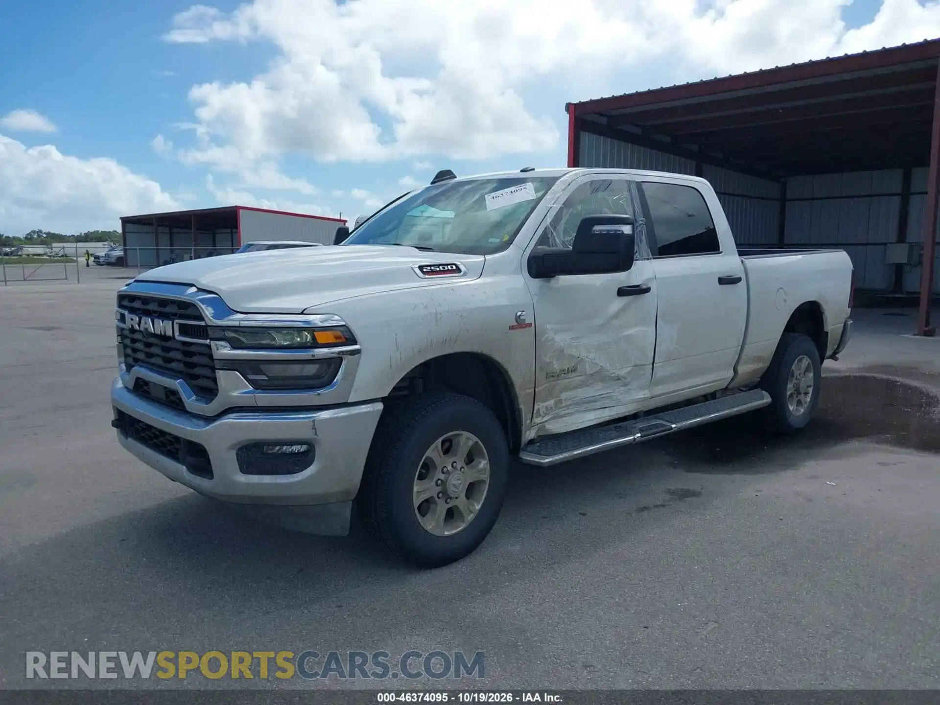 2 Photograph of a damaged car 3C6UR5DLXTG261121 RAM 2500 2026