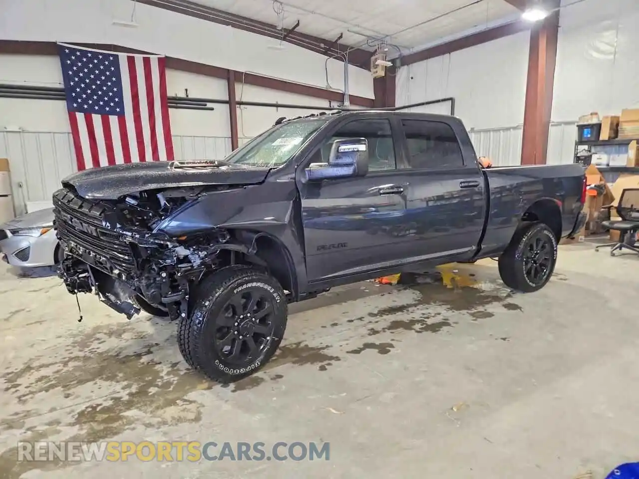 1 Photograph of a damaged car 3C6UR5FJ1TG355254 RAM 2500 2026