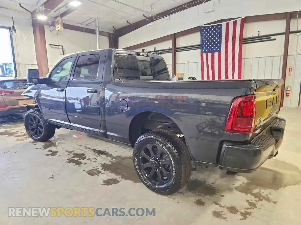2 Photograph of a damaged car 3C6UR5FJ1TG355254 RAM 2500 2026