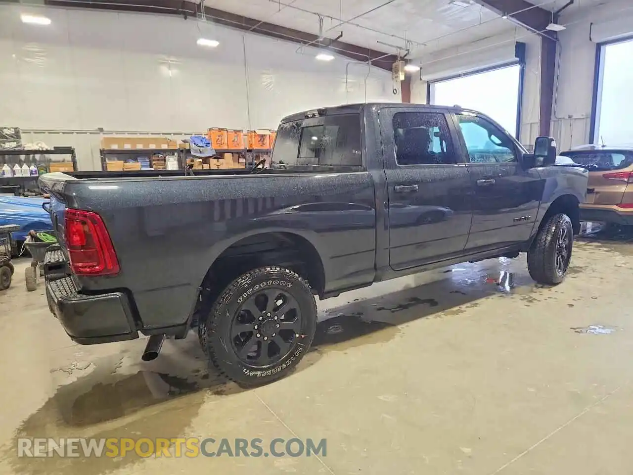 3 Photograph of a damaged car 3C6UR5FJ1TG355254 RAM 2500 2026