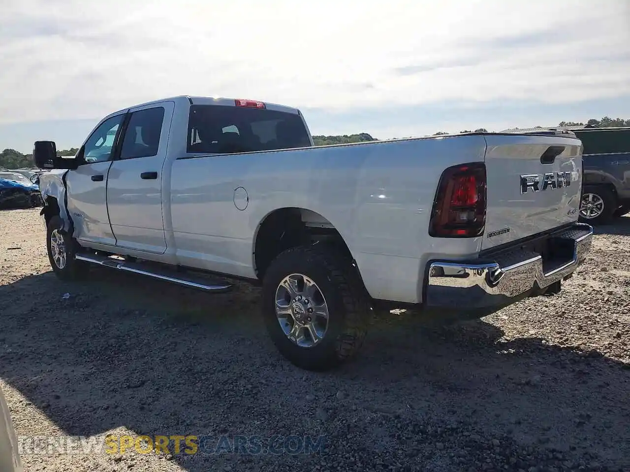 2 Photograph of a damaged car 3C6UR5JL6VG380999 RAM 2500 2027