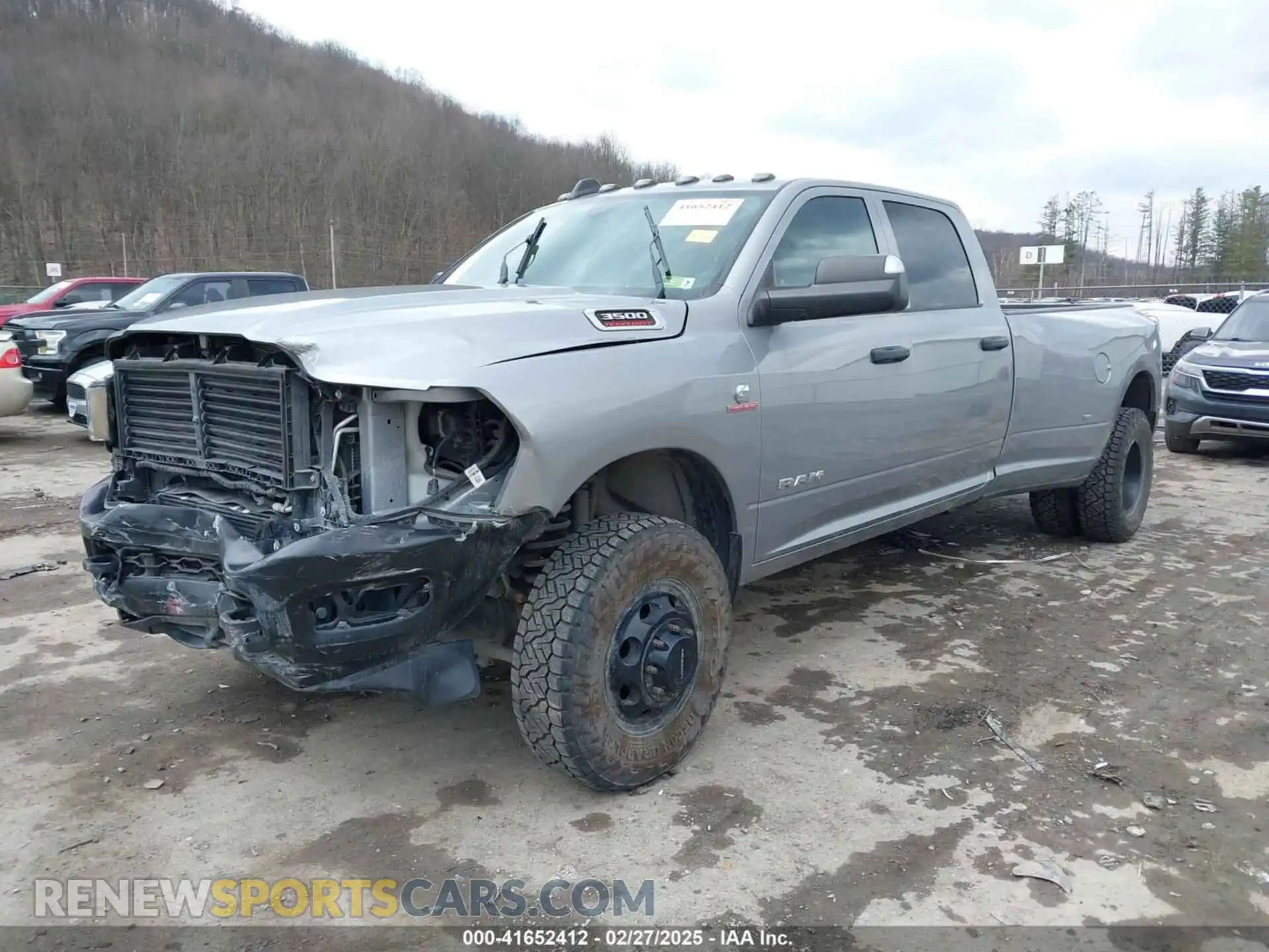 2 Photograph of a damaged car 3C63RRGL0NG114484 RAM 3500 2022
