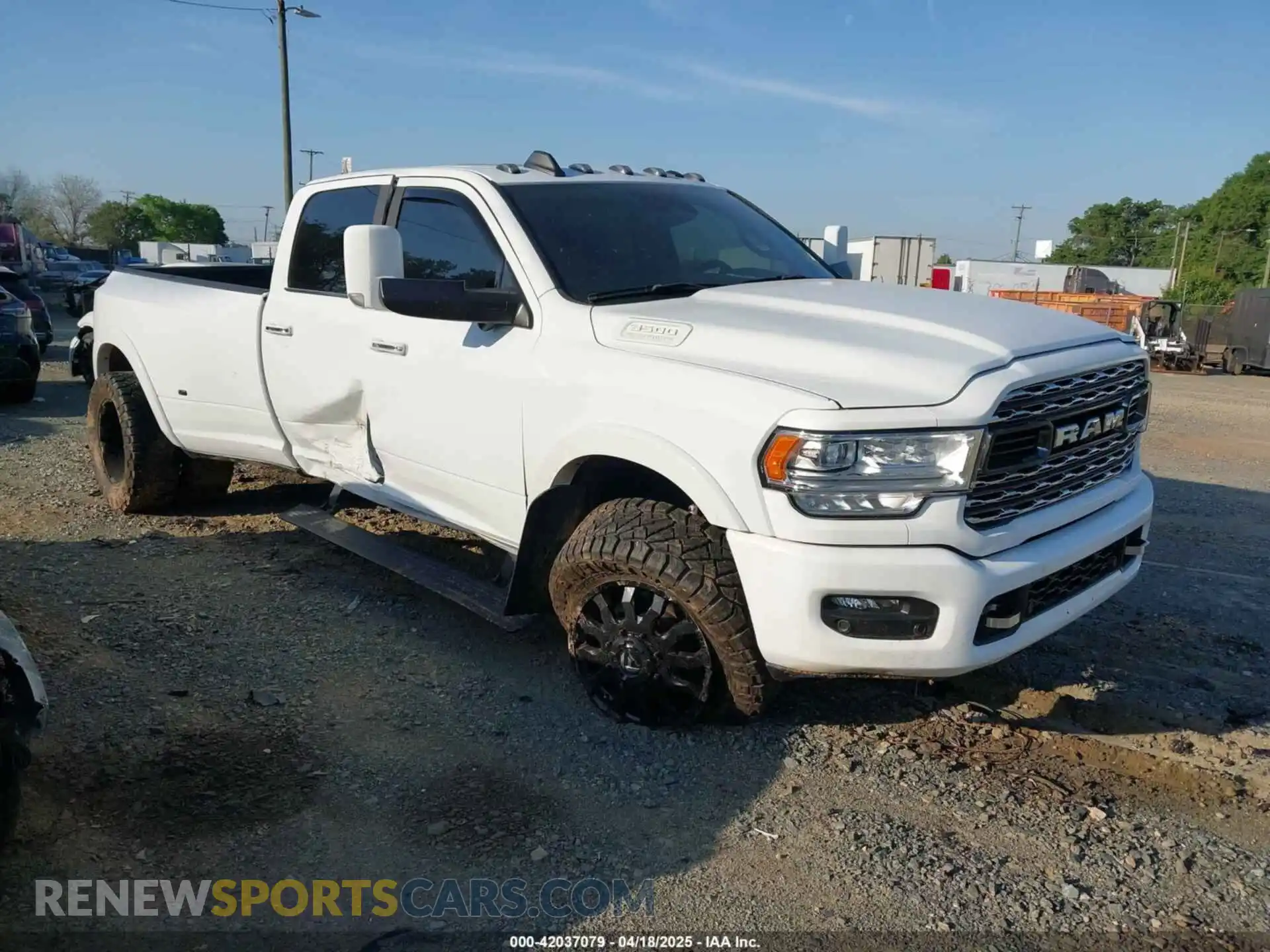 1 Photograph of a damaged car 3C63RRRLXNG312714 RAM 3500 2022