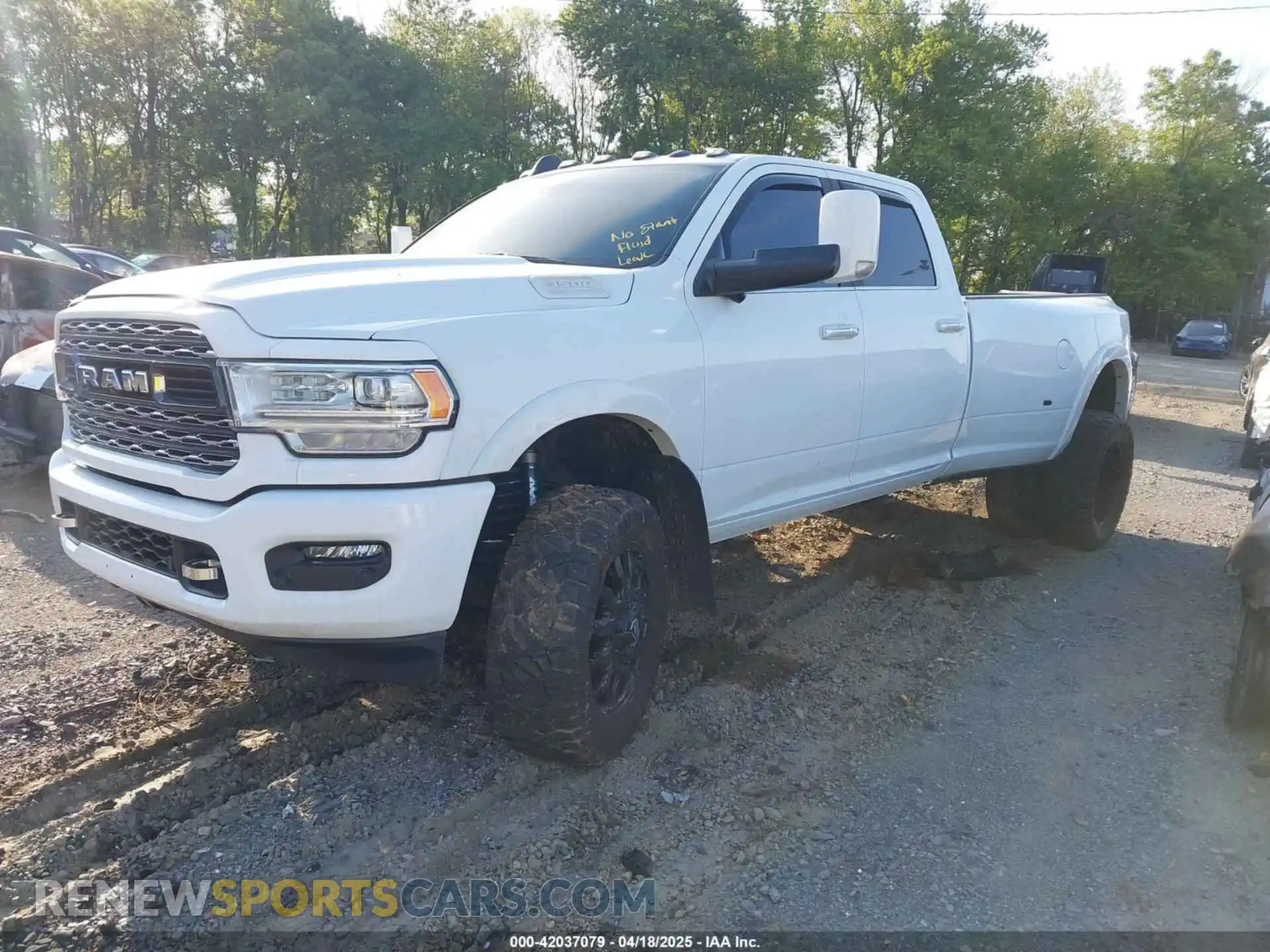 2 Photograph of a damaged car 3C63RRRLXNG312714 RAM 3500 2022