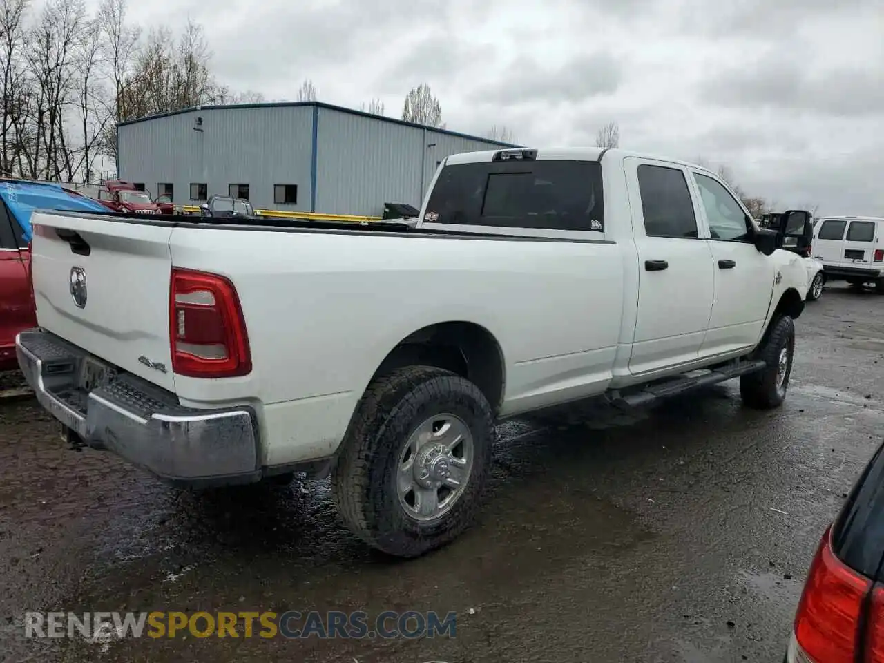 3 Photograph of a damaged car 3C63R3GL9PG623652 RAM 3500 2023