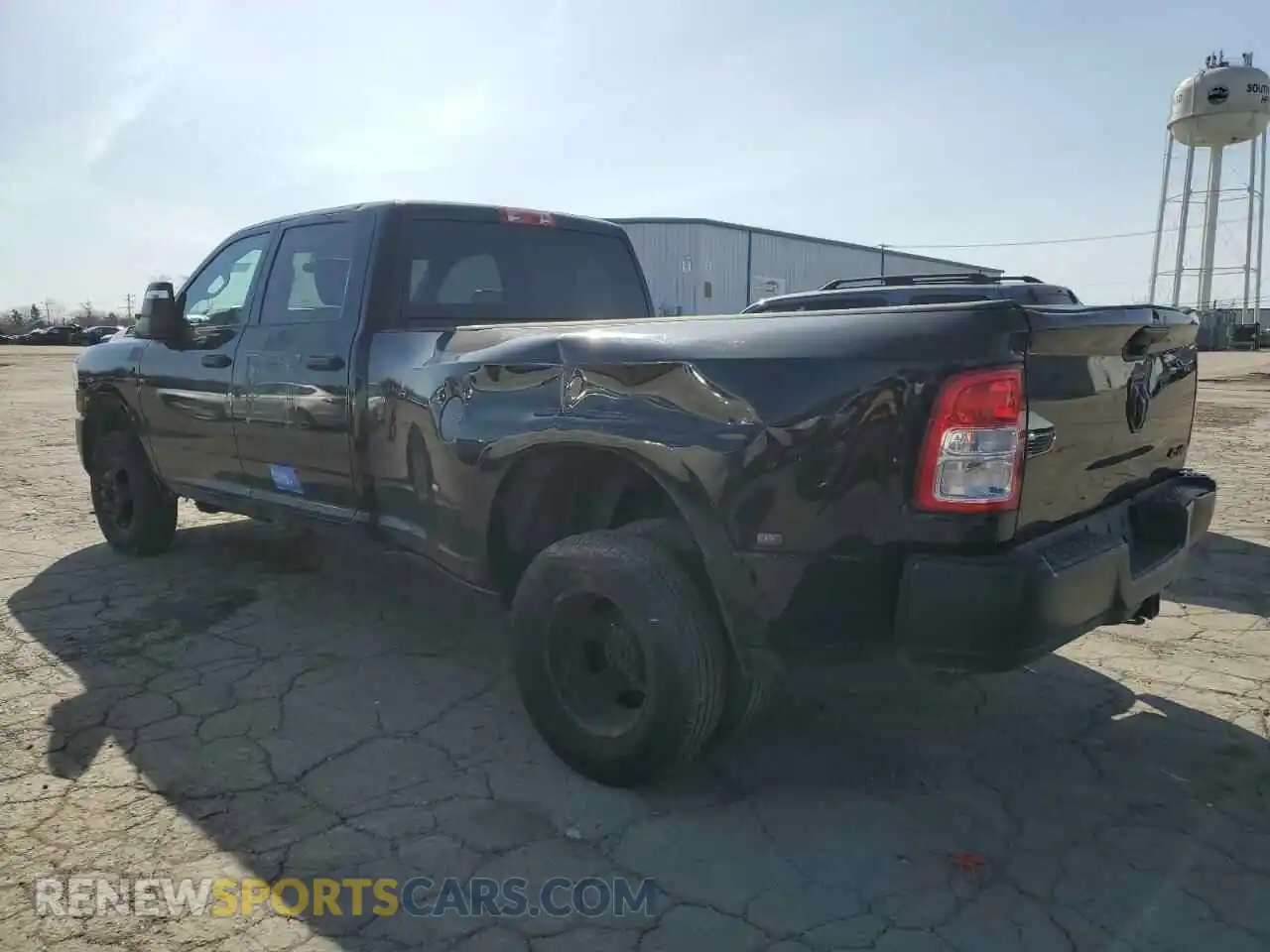2 Photograph of a damaged car 3C63RRGL6PG501303 RAM 3500 2023