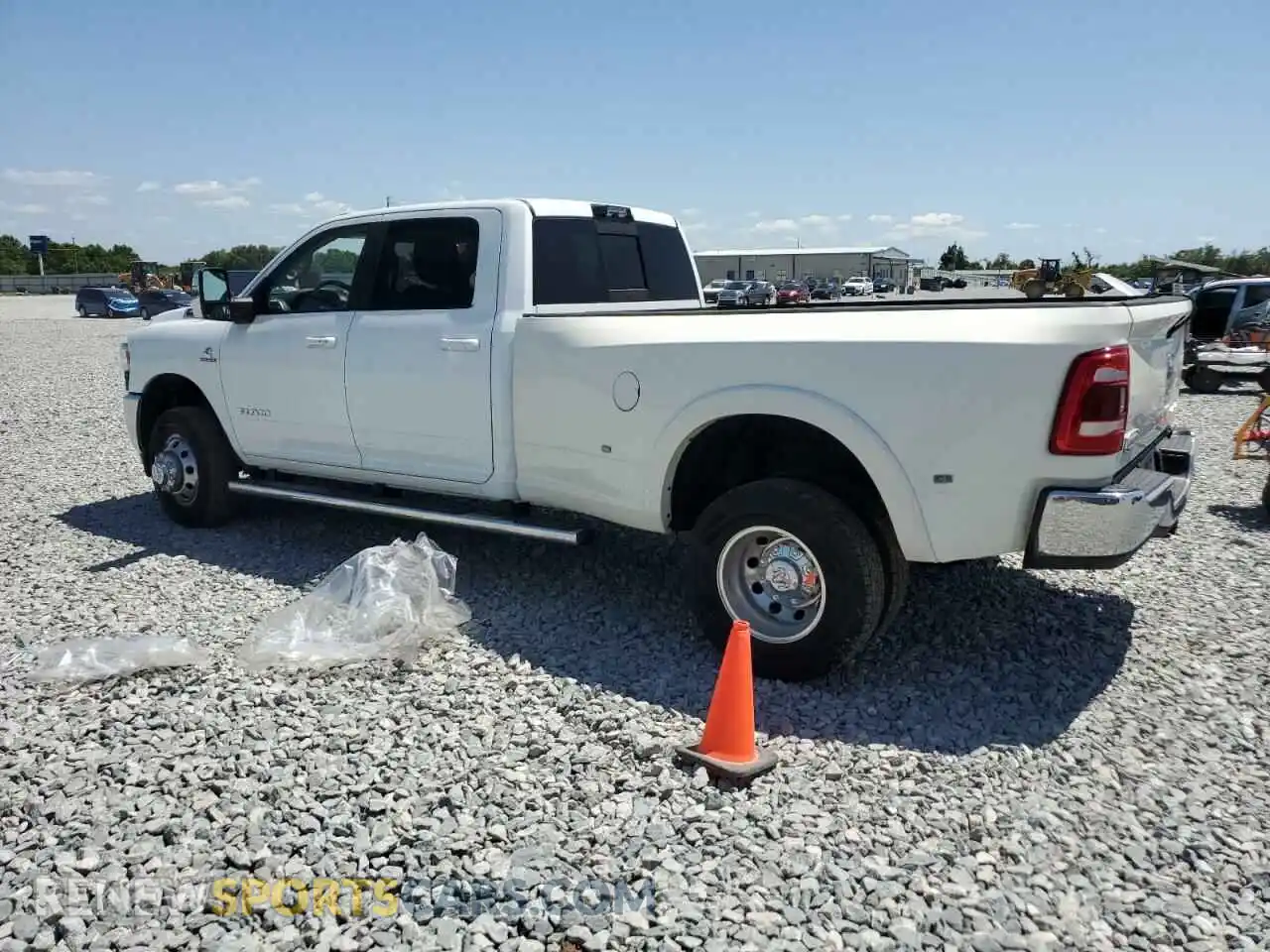 2 Photograph of a damaged car 3C63RRJL1PG522245 RAM 3500 2023
