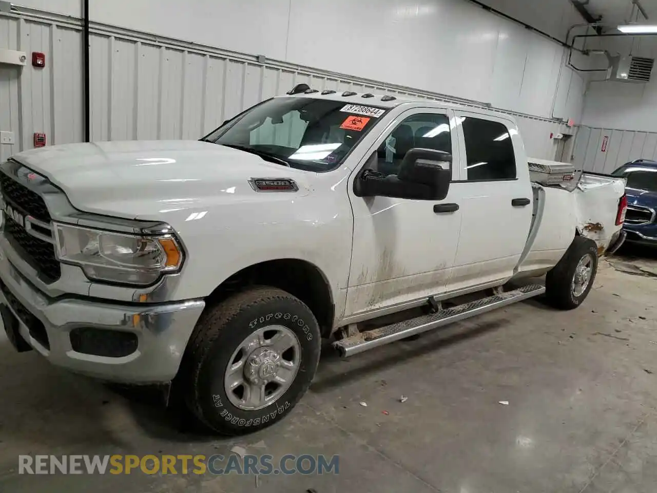 1 Photograph of a damaged car 3C63R3GJ1RG187364 RAM 3500 2024