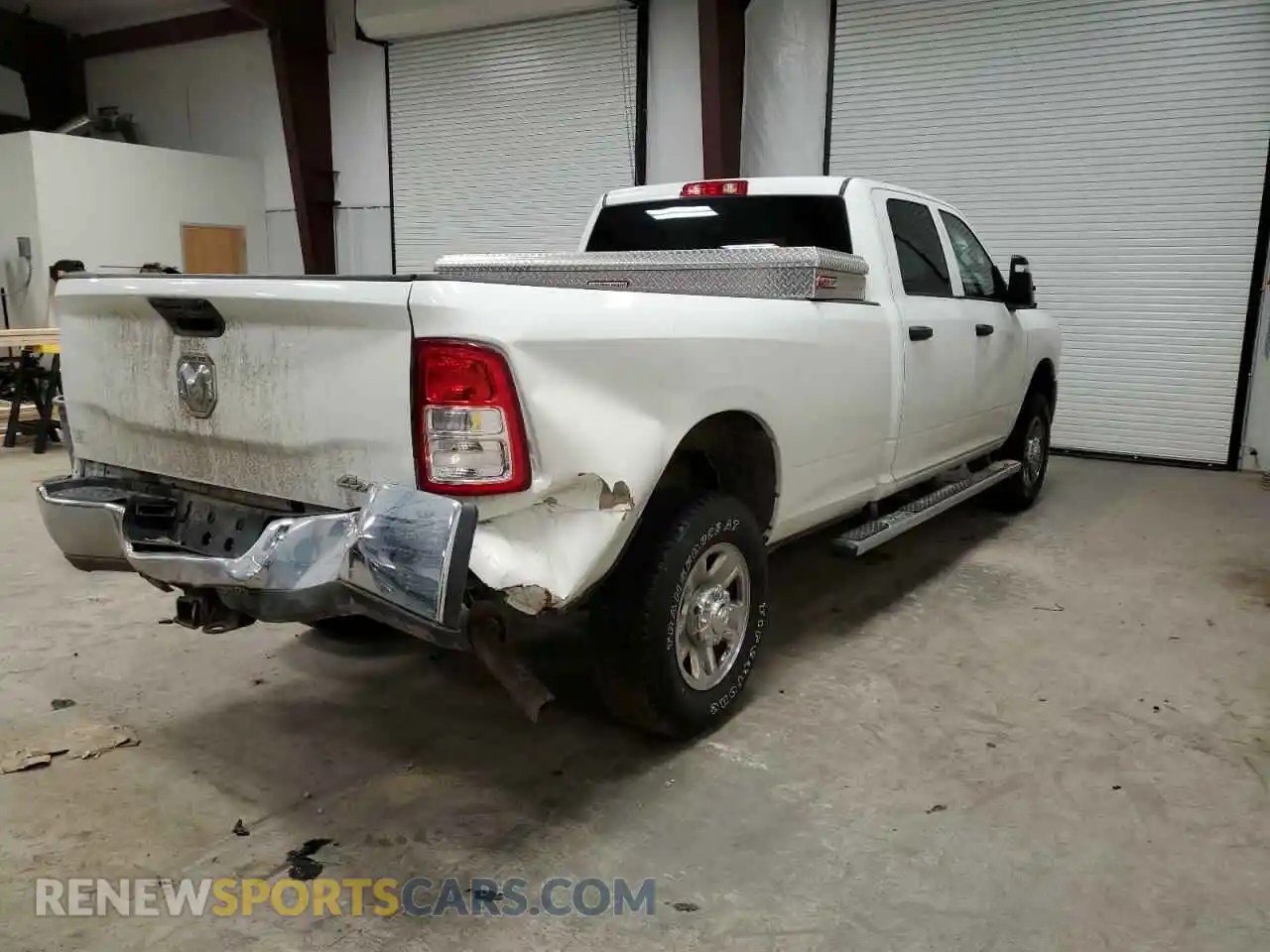 3 Photograph of a damaged car 3C63R3GJ1RG187364 RAM 3500 2024