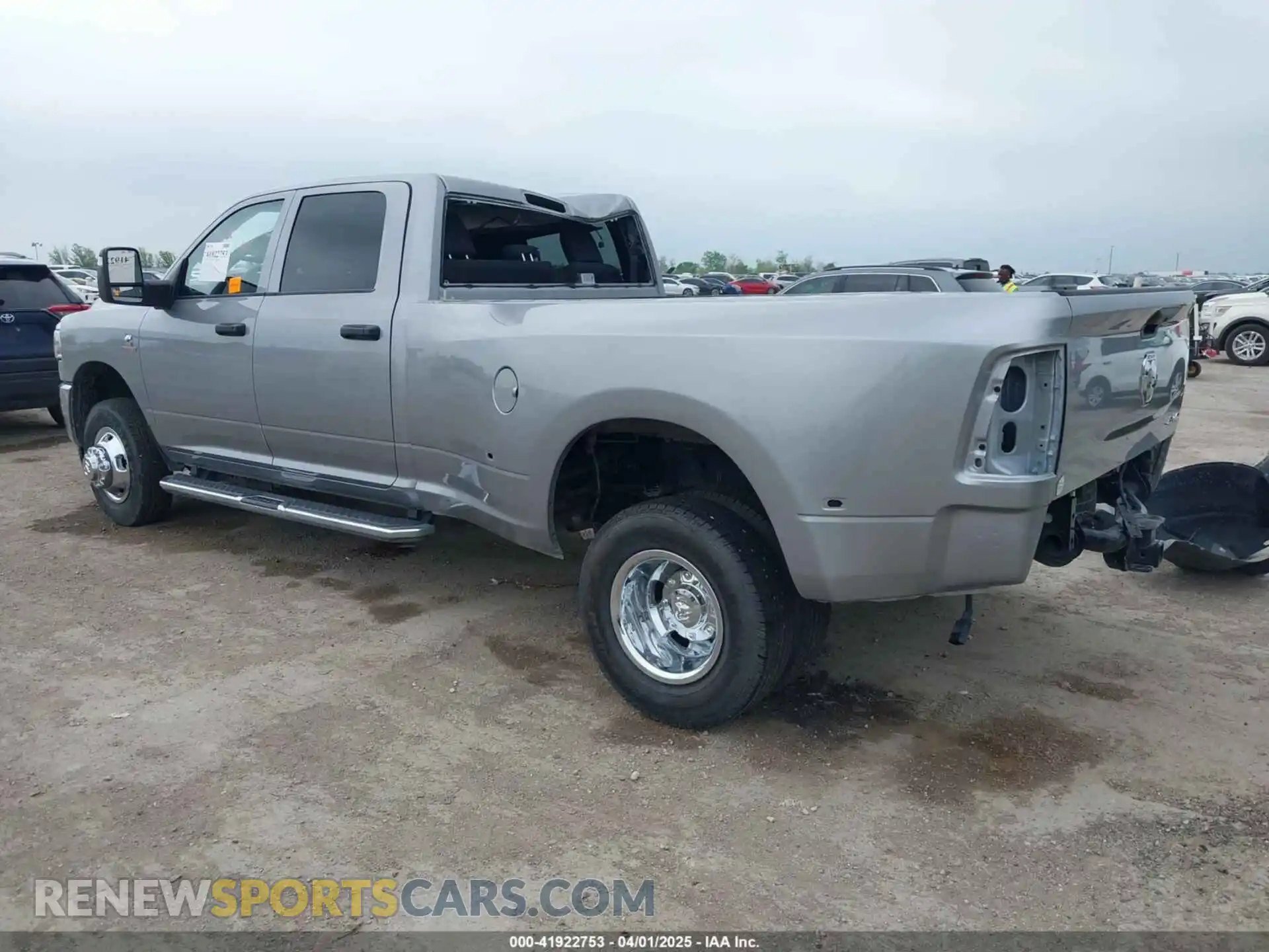 3 Photograph of a damaged car 3C63RRGL4RG241955 RAM 3500 2024