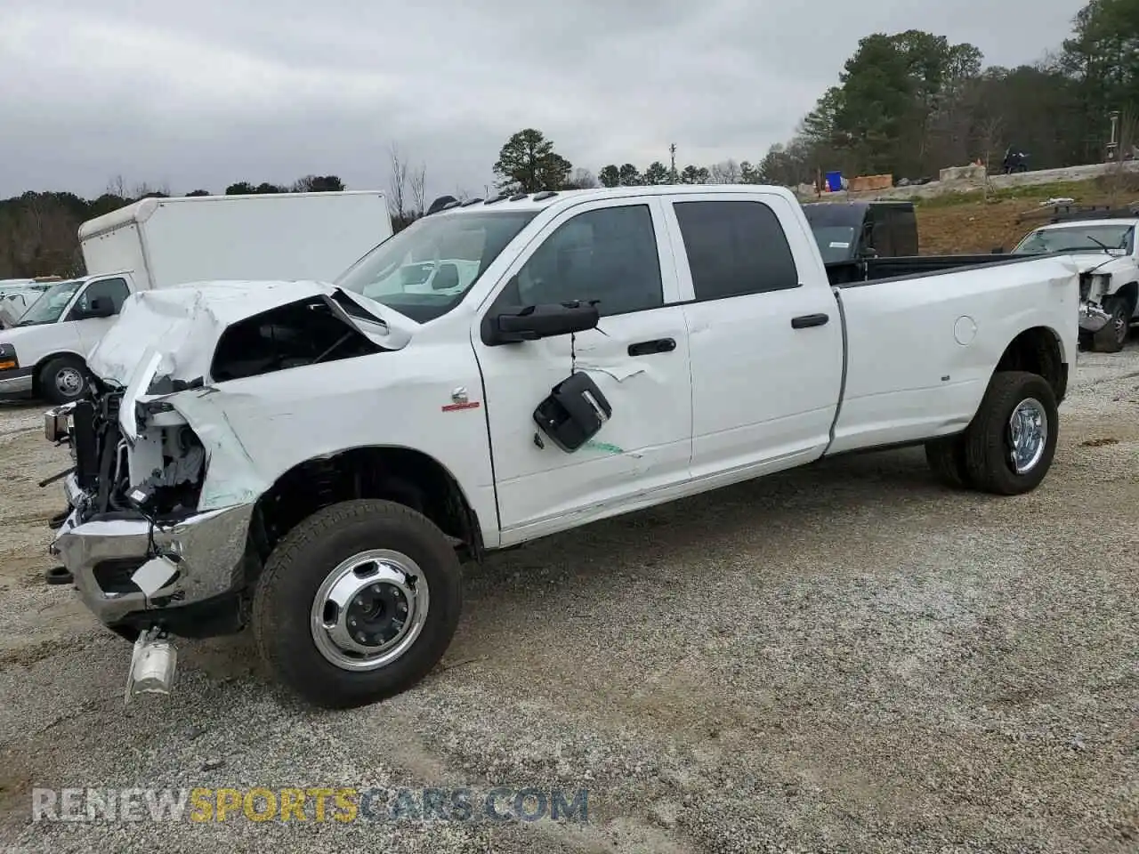1 Photograph of a damaged car 3C63RRGL6RG391646 RAM 3500 2024