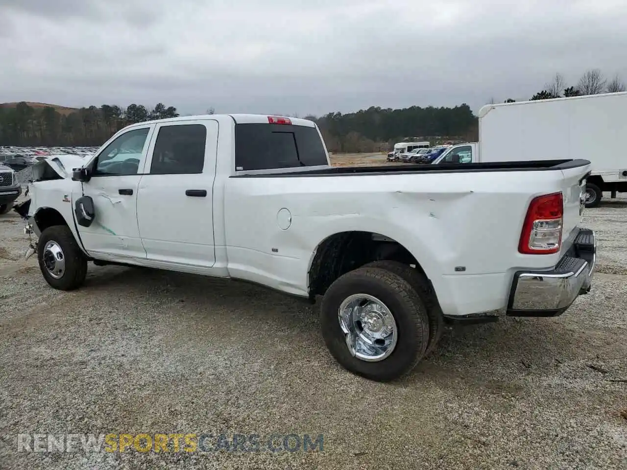 2 Photograph of a damaged car 3C63RRGL6RG391646 RAM 3500 2024